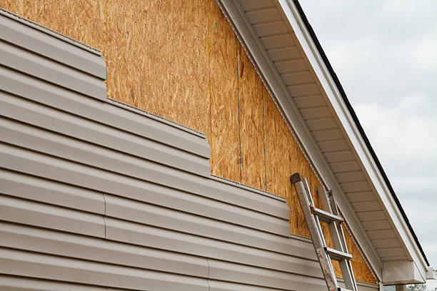 Professional Emergency Siding Repair technician working in Keller, TX
